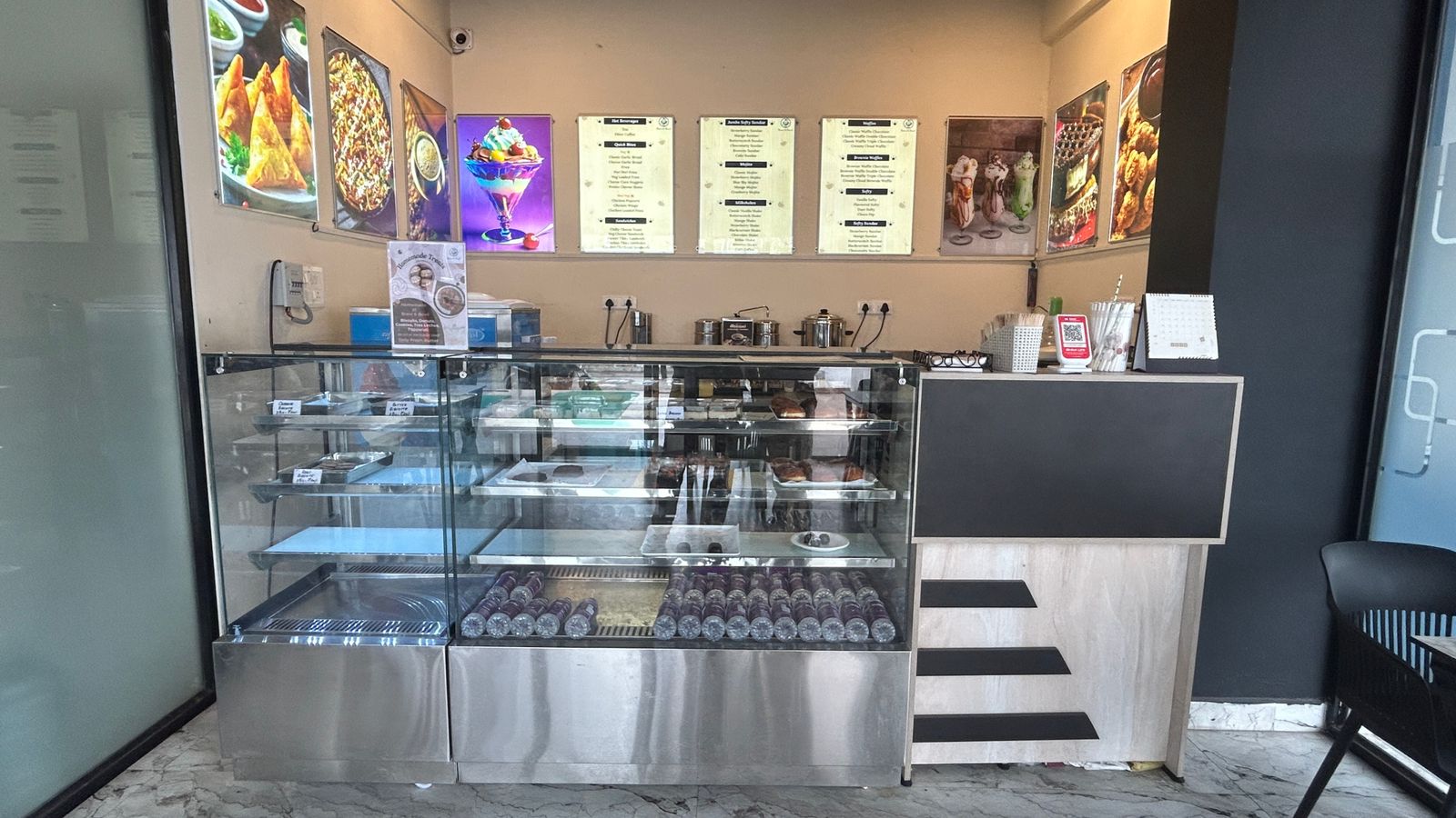 Cafe counter with desserts and bakes