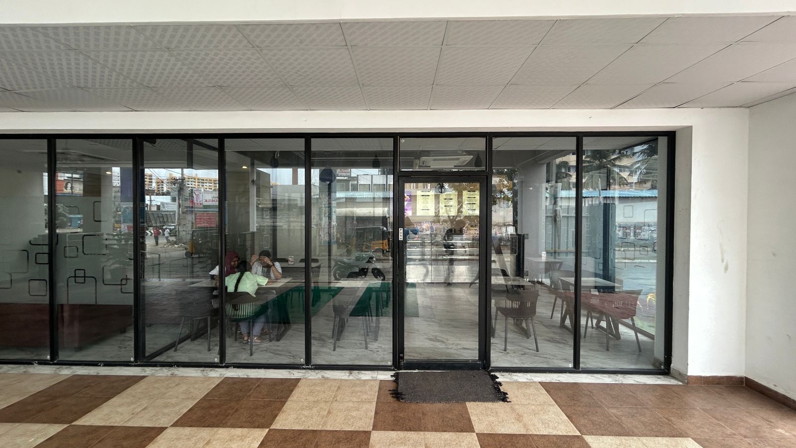 Cafe entrance with glass facade