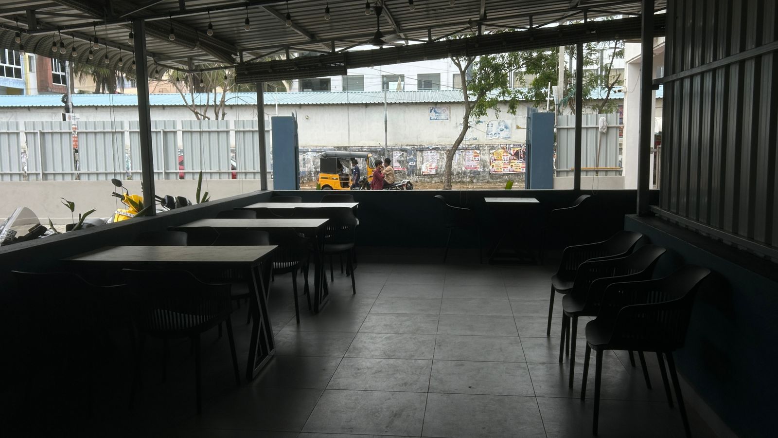 Outdoor cafe seating at Brew & Bowl